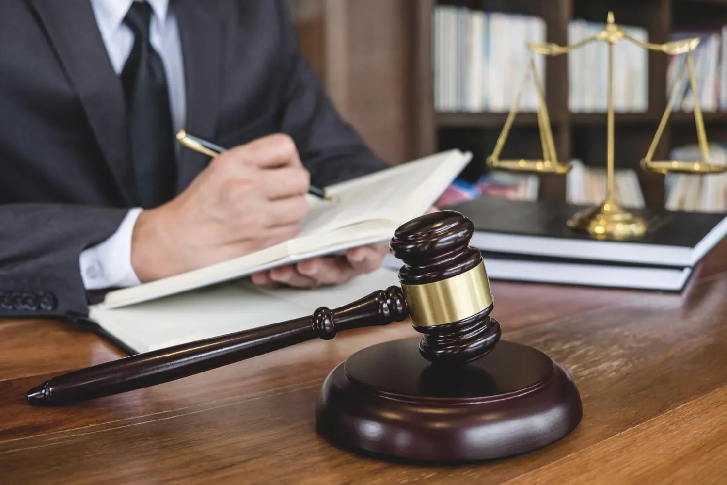 dui lawyer writing at his desk