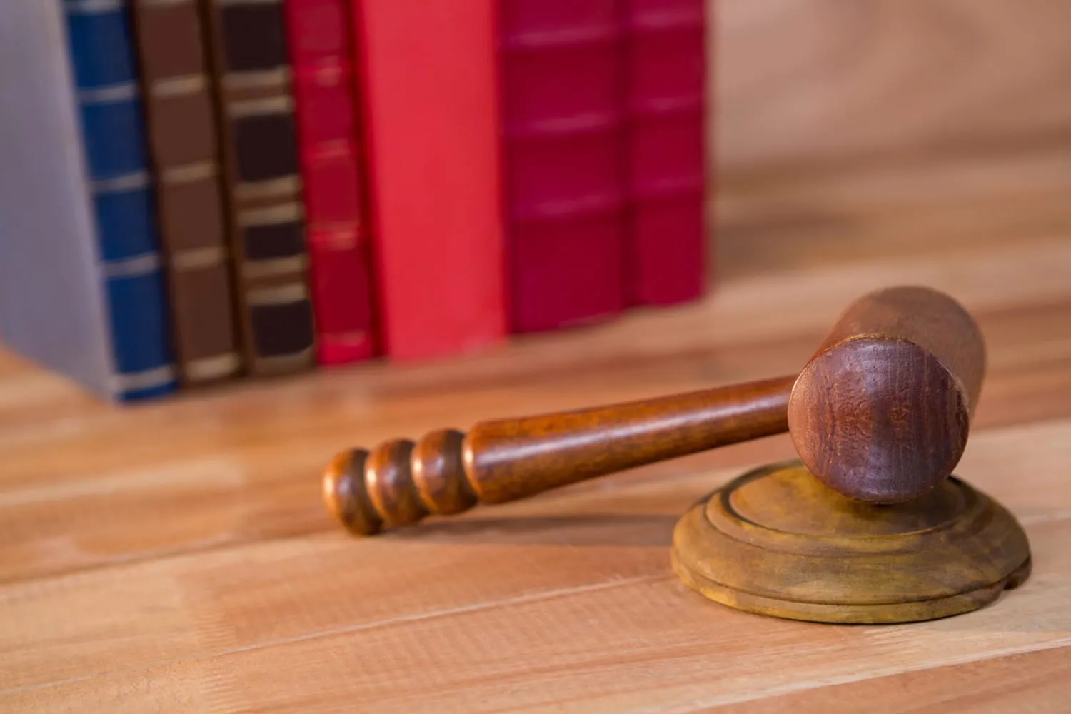 gavel in front of a book shelf