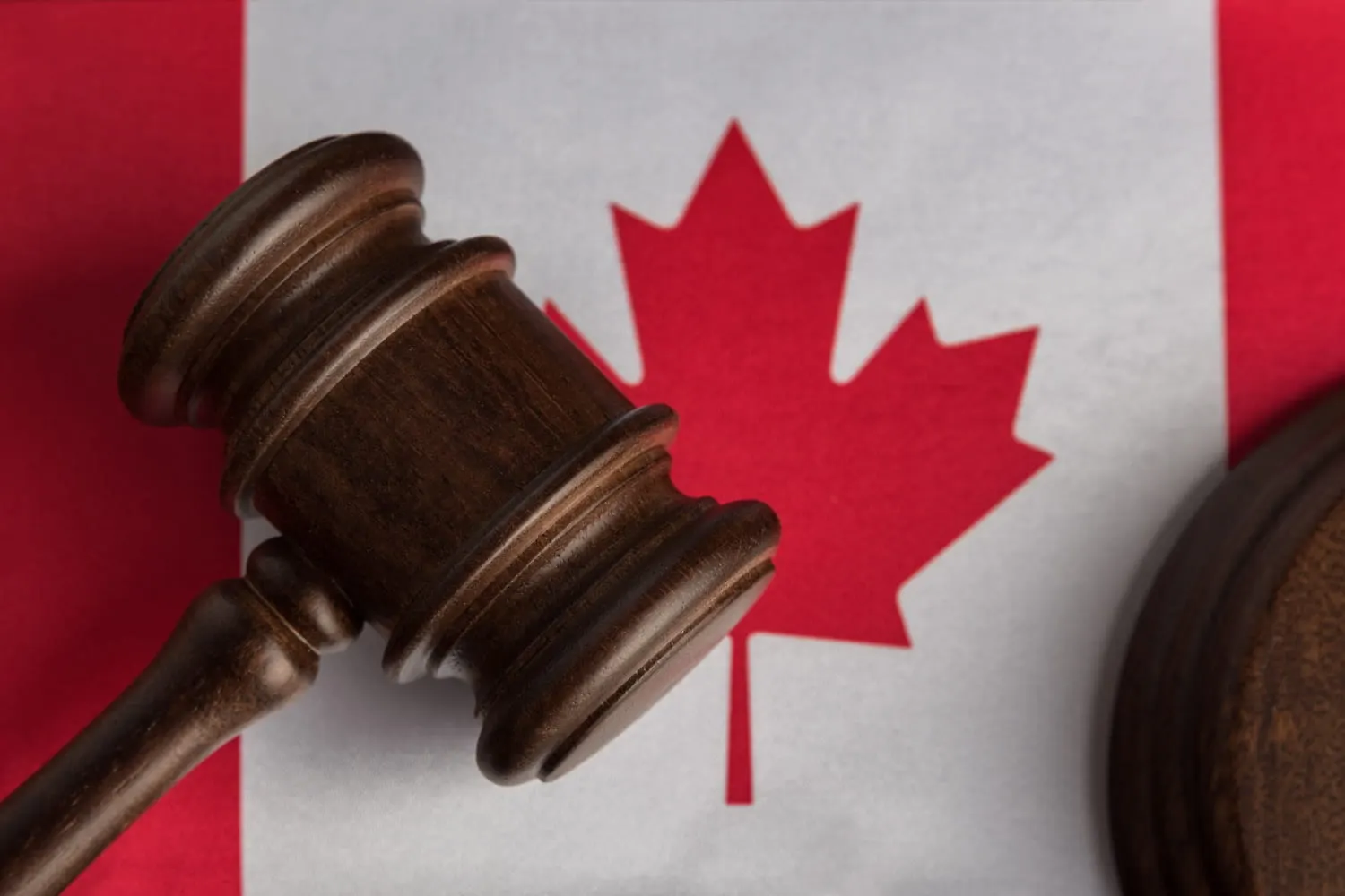 judge's gavel on the flag of canada